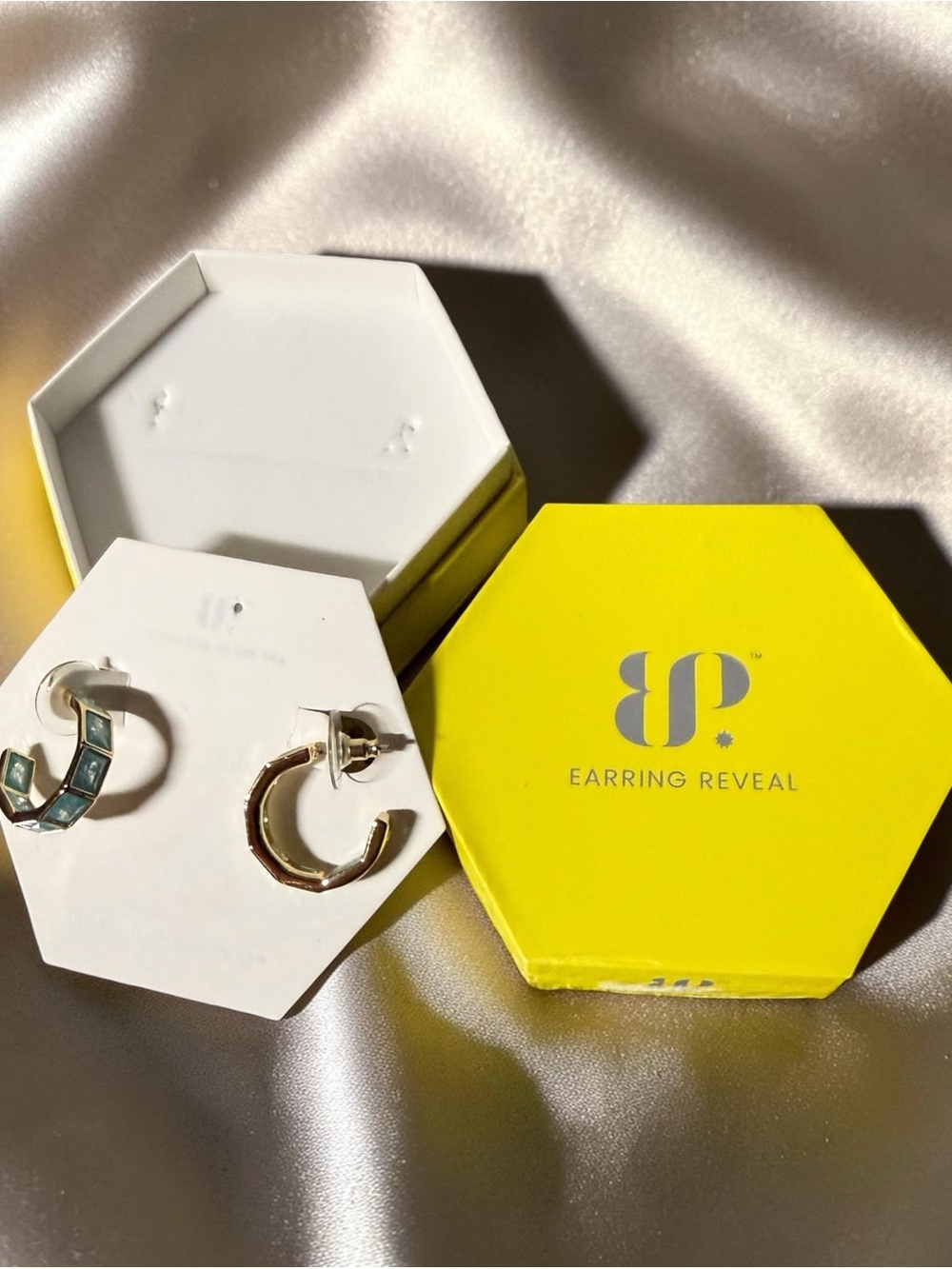 Bomb Party ‘Promise Etched in Shine’ earrings.